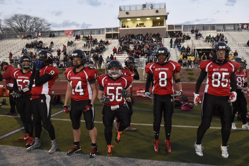From left: Boston Renegades, Deanna Walsh, Sandra “Gumby” Nesbitt, Sarah Viola, Kate Miechkowski, Asia AsantË, and Emily Weinberg get ready to play their first game against the Central Maryland Seahawks at Dilboy Stadium, April 18, 2015. (Wicked Local Staff Photo/ Sam Goresh)