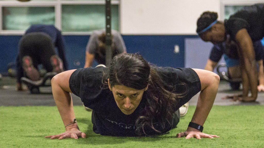 Chief Marketing Officer Erin Baumgartner conditions with the team at CrossFit ARES. —Guru Amar Khalsa/Boston.com