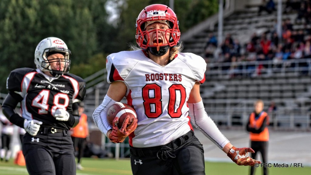 J.J. Seiles scores a touchdown for her Helsinki Roosters.