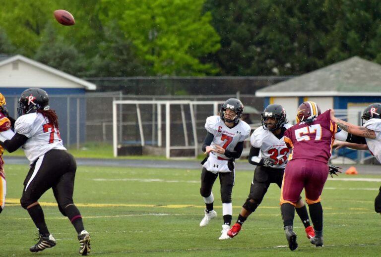 Allison Cahill of the Boston Renegades throws a football