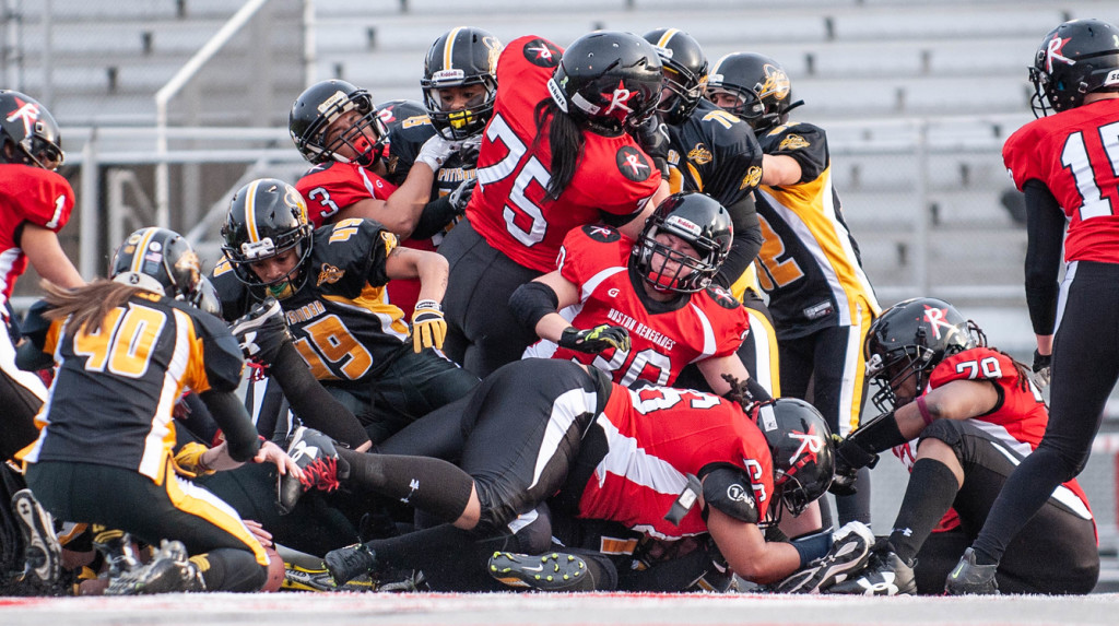 Massive pileup of players during a football game