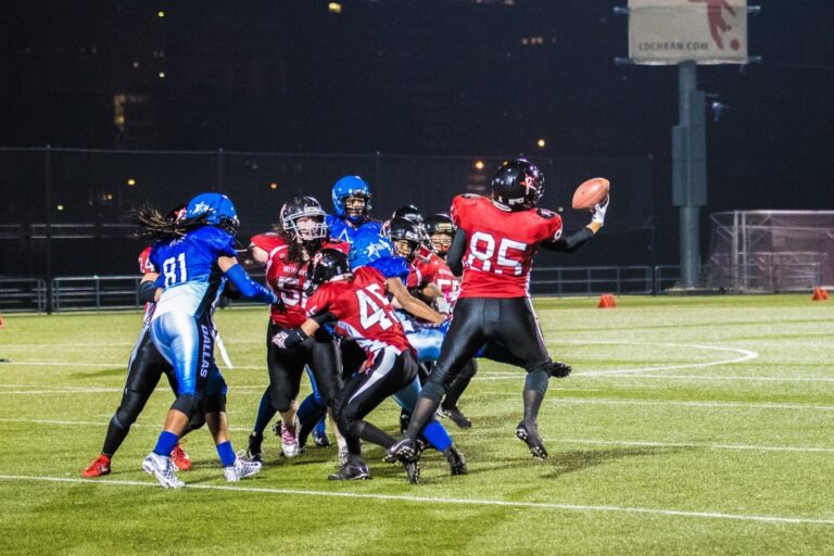 Boston Renegade Linebacker Jessica Penta recovers a fumble by the Dallas Elite