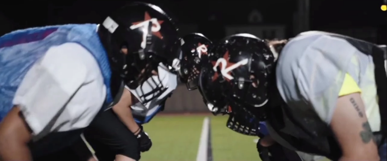 Still of Boston Renegades players at practice from the documentary 'Born to Play'