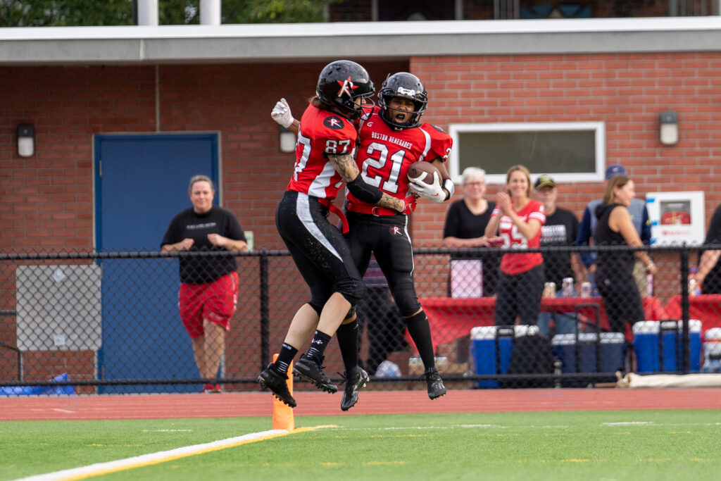 Boston Renegades players celebrate a touchdown