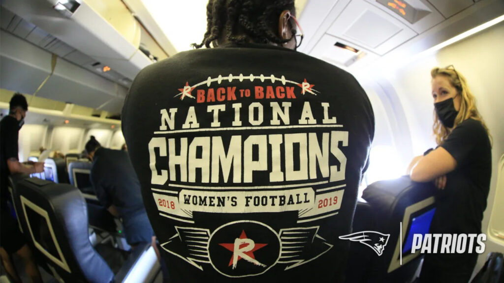 Jessica Cabrera sports a National Champions t-shirt aboard the New England Patriots team plane.