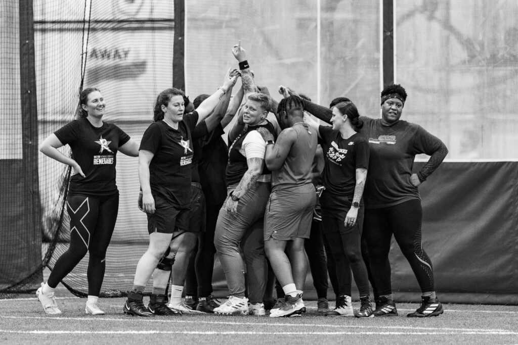 Veteran and rookie Renegades huddle during training camp.